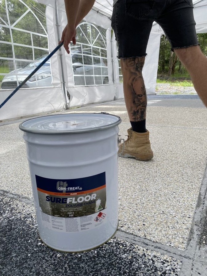 Operator training with SureFloor polyurethane and flake system